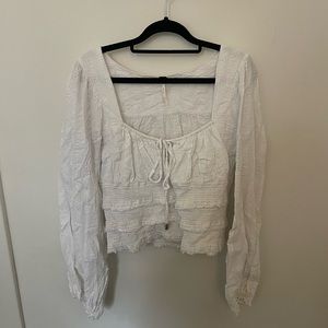 Free people too with balloon sleeve detail and scoop neckline